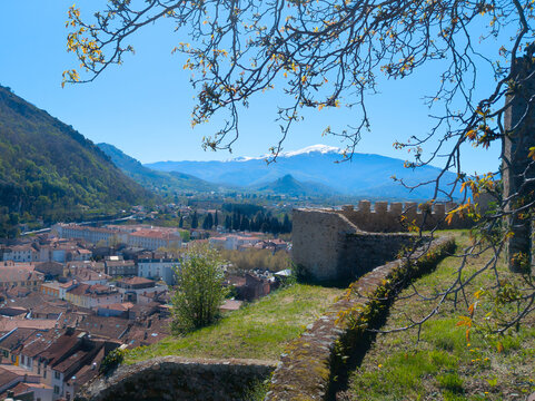 Town view of Foix with mountains in the background