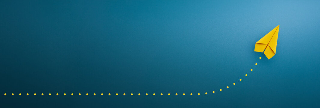Yellow Paper Plane Flying Upward Following Dotted Line Growth Concept