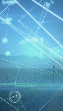 Vertical video: Construction worker entering frame holding plans inspecting with HUD aligning plans