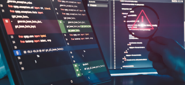 Code Error Detection and Software Debugging Concept with Warning Symbol in Magnifying Glass on Programming Screens