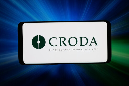 Stuttgart, Germany - 04-09-2026: In this photo illustration, the logo of chemicals company Croda International plc is displayed on a smartphone in front of abstract background on computer screen.
