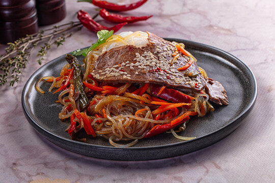 Asian funchosa noodles with beef