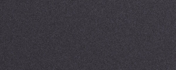 Fototapeta premium Dark Charcoal Dense Lava Rock Texture with Minimal Pores and Heavy Rock Surface