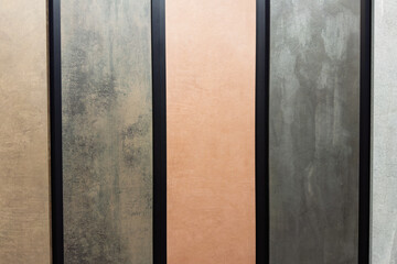 Fototapeta premium Diverse textured wall panels showcasing unique colors and finishes for interior design inspiration