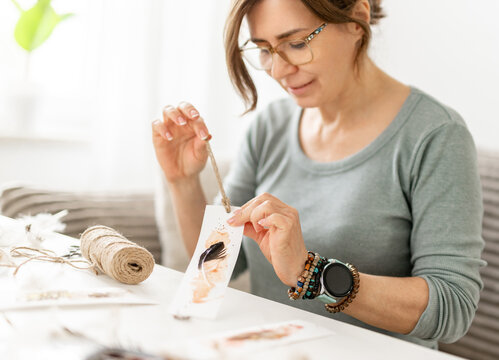 Woman Handmade Crafts By Making A Bookmark Close-Up Of Hand