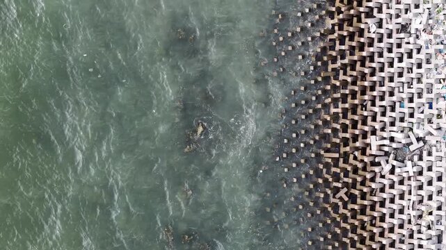 Aerial drone view of interlocking coastal barrier at Ban Pecah