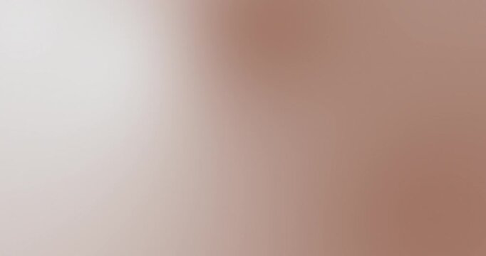 Abstract Mocha Mousse Beige Brown nude gradient background video. Smooth warm neutral tones with subtle fade, and creamy light glow. Minimal elegant seamless loop 4K backdrop for luxury desig