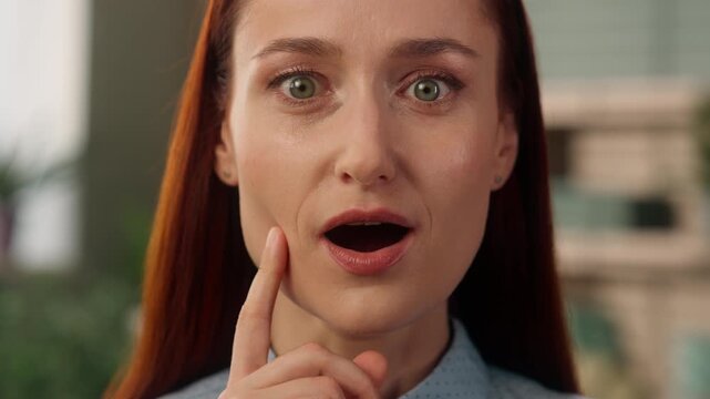 Close up shocked Caucasian business woman open mouth surprised female entrepreneur amazed expression face wow news astonished businesswoman girl excitement stunned impressed emotion indoors office