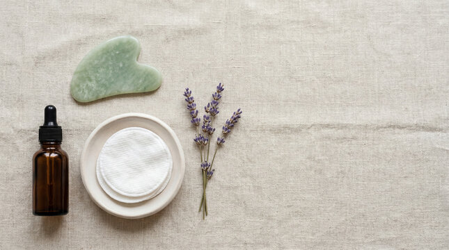 Minimal skincare products flat lay on neutral background