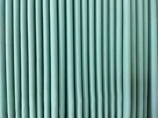 Obraz premium Green Minimalist Fabric Texture Background with Vertical Lines. Green curtain. Elegant background.