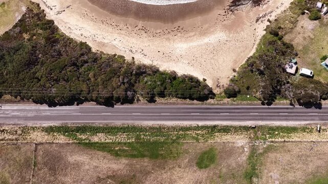 Bass highway close by ocean on North West coast of Tasmania by Edgcumbe beach.