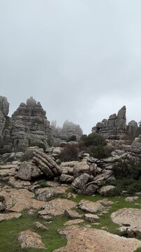 Ancient Limestone Rocks Enveloped in Thick Mist