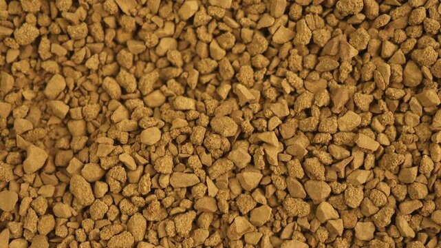rotating pile of freeze-dried granulated instant coffee