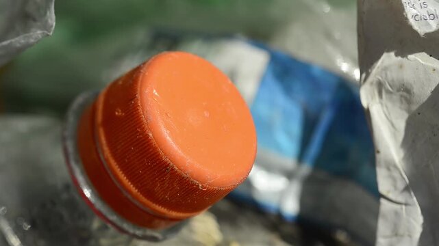 Discarded plastic bottle polluting the environment