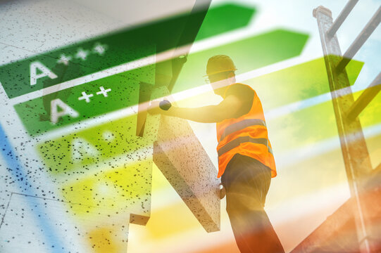 Worker completes energy efficiency project in urban area using graded materials and measures for building improvement