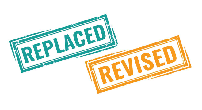 Close-up of two rubber stamps with the words replaced and revised in bold orange and blue ink on white background