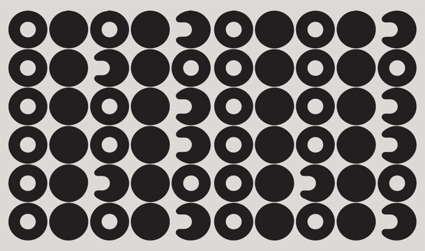 A grid pattern of black circles and crescent shapes on a light grey background for visual test
