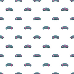 Game controllers forming a seamless repeating pattern on a white background © nsit0108