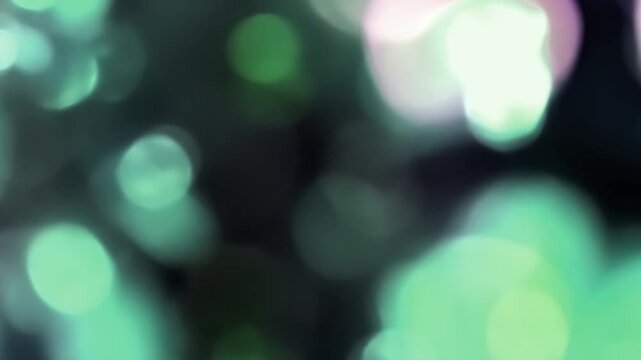 abstract soft green and purple multi color bokeh motion loop