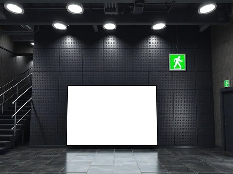Empty stage with green exit sign