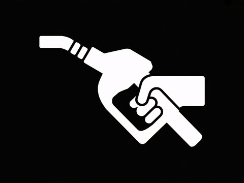 A hand holding a gas pump nozzle on a black background