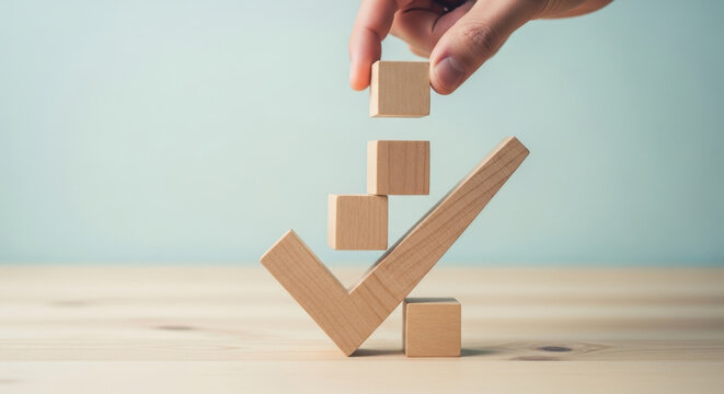 Wooden Blocks Making Checkmark Sign on Wooden Table. Symbol Success. Concept Checkmark Sign Success Goal Achievement Plan Complete. Business Concept
