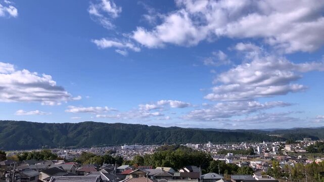Short 6-Second 4K Timelapse of Clouds Over Mountain Town (No Audio)