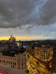Fototapeta premium Madrid skyline at sunset with dramatic clouds and city view