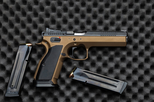 Bronze 9x19mm pistol with two magazines