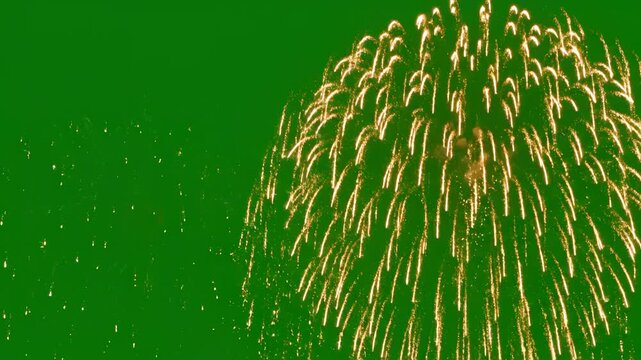 Fireworks against green background for commercial backgrounds, digital design, and advertising