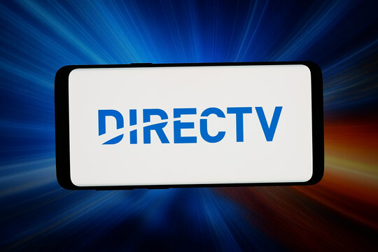 Stuttgart, Germany - 04-09-2026: In this photo illustration, the logo of television distribution company  DirecTV LLC is displayed on a smartphone in front of abstract background on computer screen.