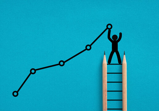 Stick figure climbing pencil ladder to success graph