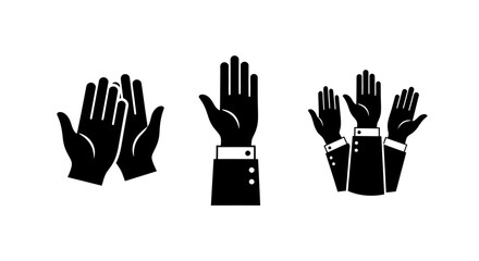 Obraz premium Group of silhouetted hands raised in unity and collective support.