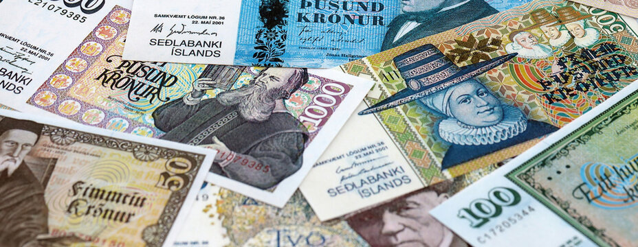 Icelandic krona money banknotes pile on table. Iceland bills of ISK currency. Concept of economy