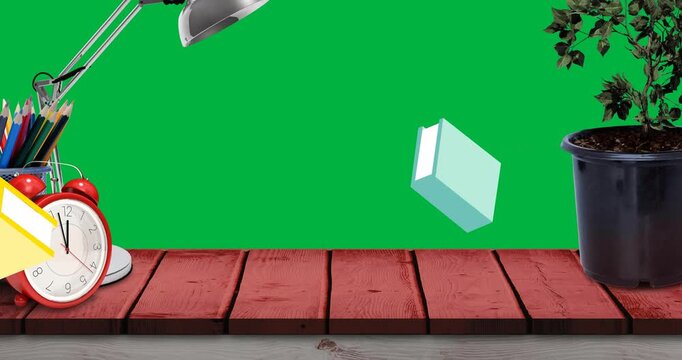 Multiple school concept icons falling over wooden surface against black background