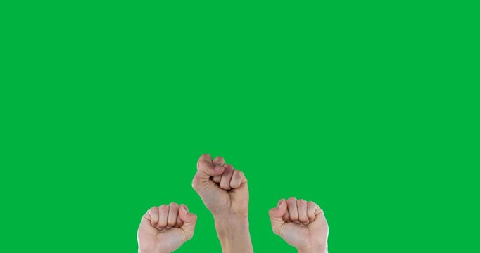 Three hands fists against copy space on black background