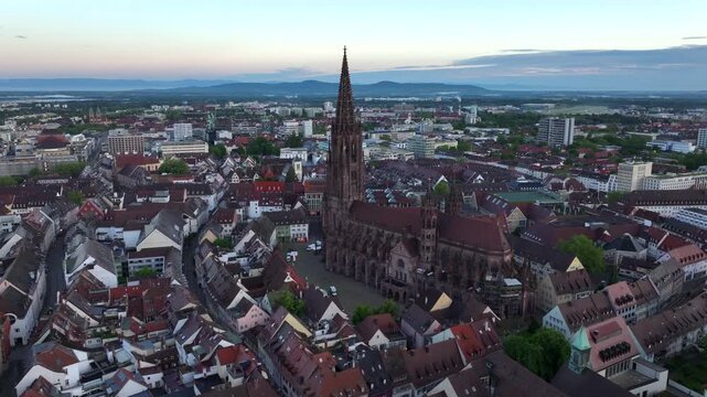 Freiburg im Breisgau, Germany at Sunrise. Aerial Drone Shot on Freiburger Dom Cathedral. 4k Drohne Footage