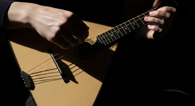 Person Playing Harmonica in Close-Up