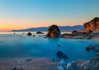 Naklejka premium Long exposure photo of sandy beach on a dusk - Mahmutlar, Alanya, Antalya Province Turkey 