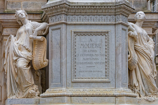 PARIS, FRANCE, April 11, 2026 : Under Moliere statue of The Fontaine Moli&egrave;re is an inscription flanked by two marble female sculptures by Jean-Jacques Pradier : Serious Comedy and Light Comedy