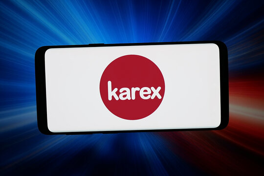 Stuttgart, Germany - 04-09-2026: In this photo illustration, the logo of Malaysian condom company Karex Berhad is displayed on a smartphone in front of abstract background on computer screen.