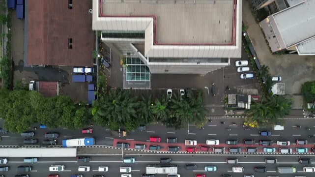 Subroto Jakarta Peak Hour Traffic Drone Rise Over Rooftops Indonesia 4K 30FPS