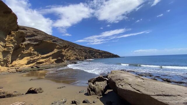 Beautiful coastal view of Playa Montana Pelada beach in Tenerife, Canary islands, Spain. Travel concept,4K video.