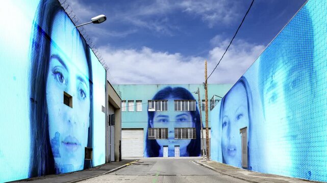 factory and industrial complex with passing clouds and fae scan woman