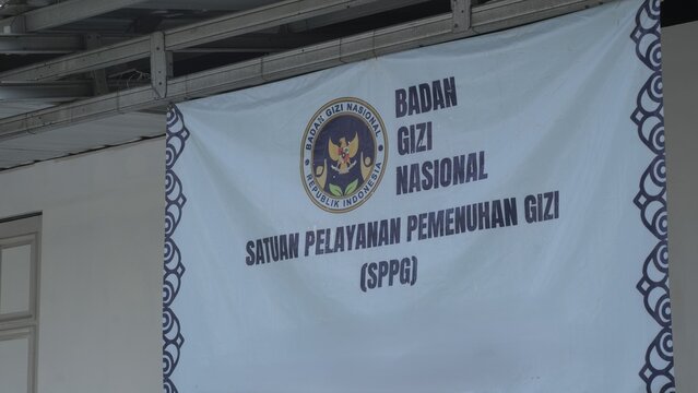 A banner of Badan Gizi Nasional or National Nutrition Agency for the Free Nutritious Meal program from the Indonesia government for school students. Jakarta, March 22, 2026