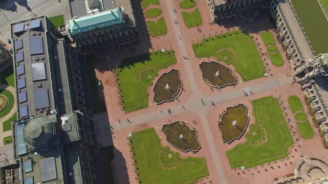 Bird's-eye view of the Dresden Zwinger courtyard, showing the symmetrical Baroque garden with four ponds and path network, adjacent to the historic building.