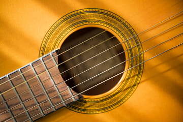 Obraz premium Guitar Background With Strings. Acoustic Music Instrument. Flat Lay Top View
