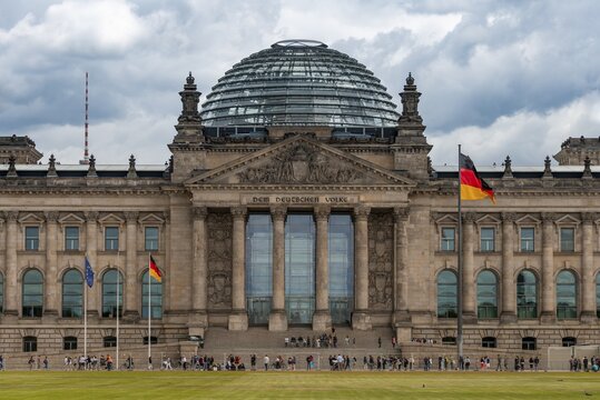 Reichstag and Germany Flag, government district, Berlin, Germany
