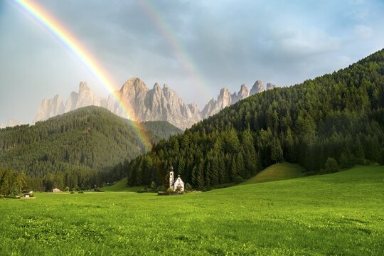 Rainbow in front of the church St. Johann in Ranui, San Giovanni, St. John's Chapel, Geisler Group, Villn&ouml;&szlig;al, St. Magdalena, Bolzano, South Tyrol, Italy