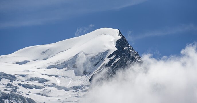 High alpine mountain landscape, summit Aiguille du Go&ucirc;ter with glacier, Glacier de Taconnaz, behind Mont Blanc, Chamonix, Haute-Savoie, France